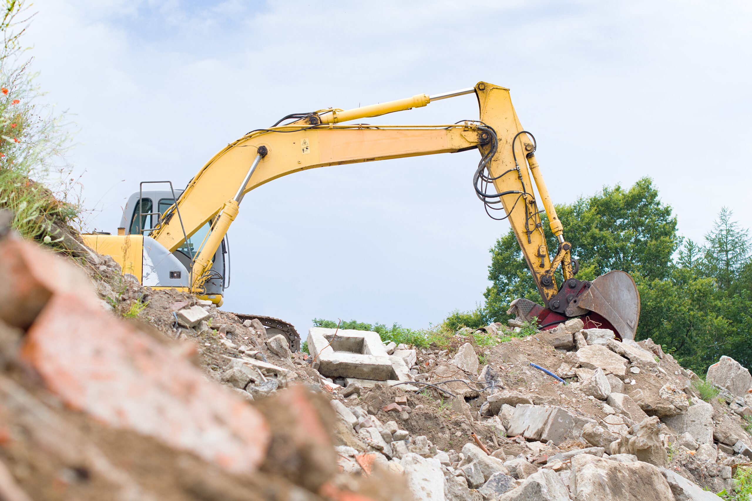 Safe and efficient structure removal with ADU Construction demolition services